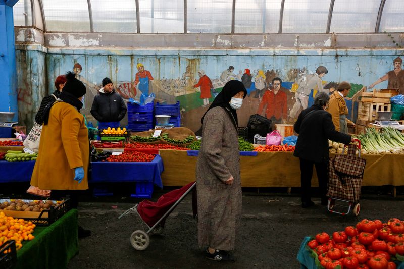FILE PHOTO: People shop at a fresh market in Istanbul
