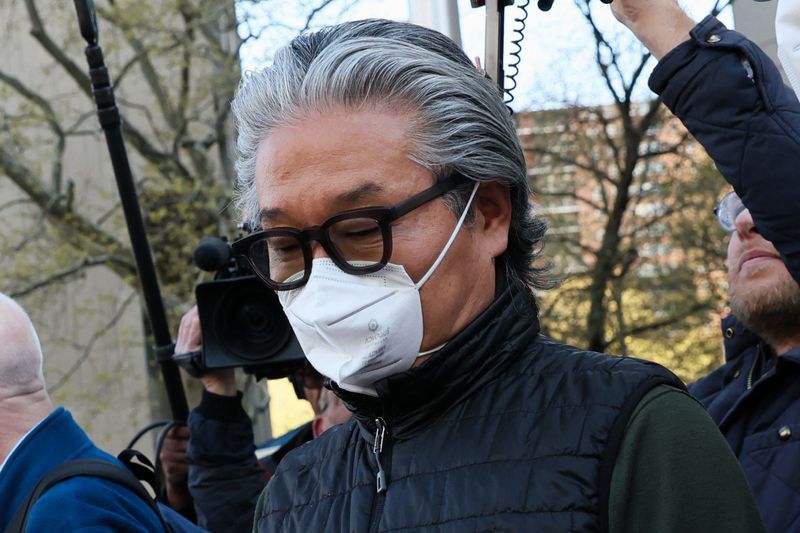 Sung Kook (Bill) Hwang exits the Manhattan federal courthouse in