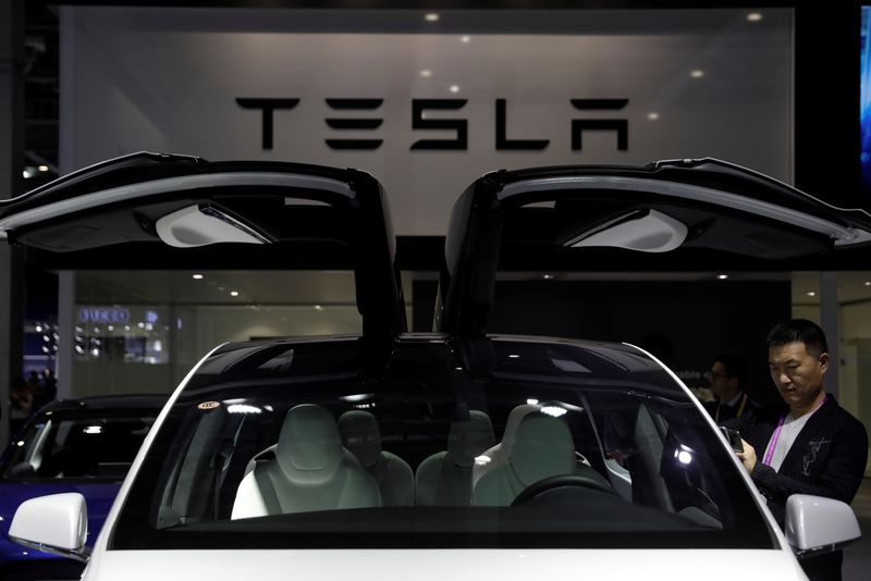 A Tesla sign is seen at the second China International