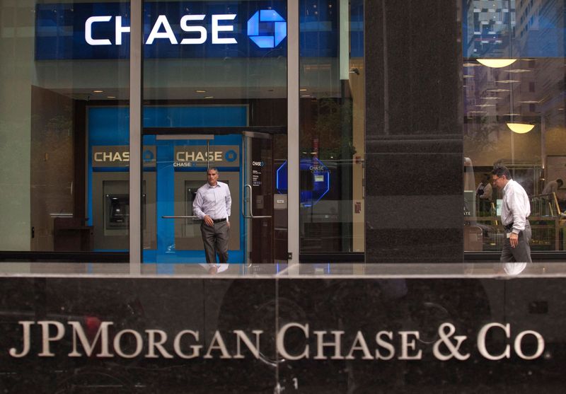 FILE PHOTO: A customer exits the lobby of JPMorgan Chase