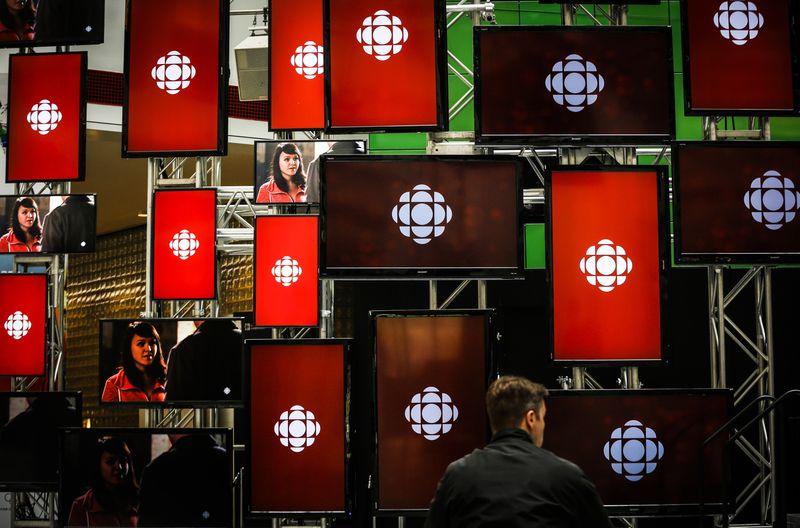FILE PHOTO: A man sits inside the Canadian Broadcast Corporation