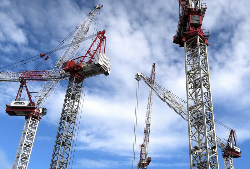 FILE PHOTO – Cranes located on construction sites are seen