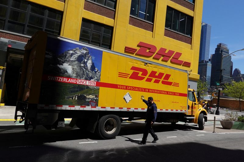 A truck parks at a DHL delivery facility in Manhattan,