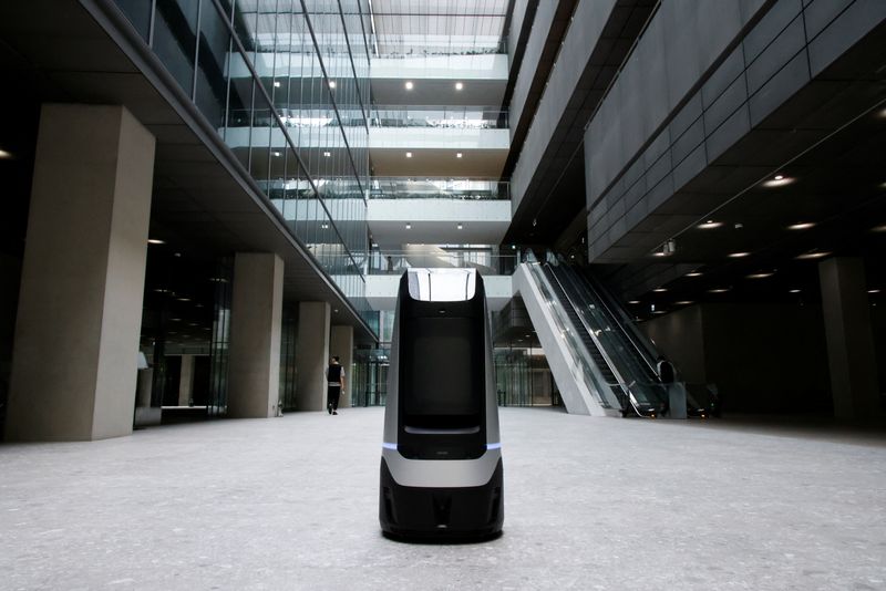 A robot using 5G network moves during a demonstration at