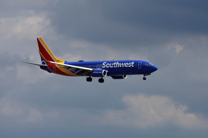 FILE PHOTO: A Southwest Airlines commercial aircraft approaches to land