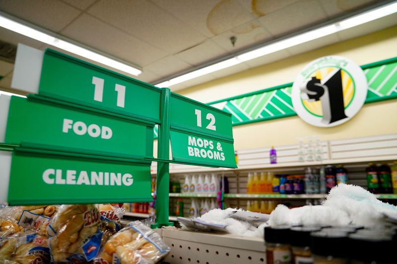 FILE PHOTO: Signs for food and cleaning supplies are seen