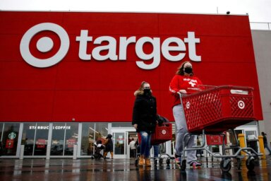 FILE PHOTO: Shoppers exit a Target store during Black Friday