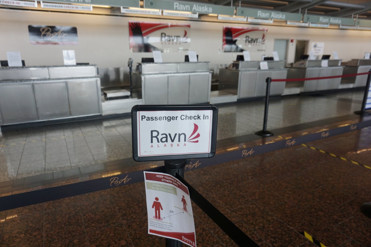 Empty RavnAir ticket counters are seen at Ted Stevens Anchorage