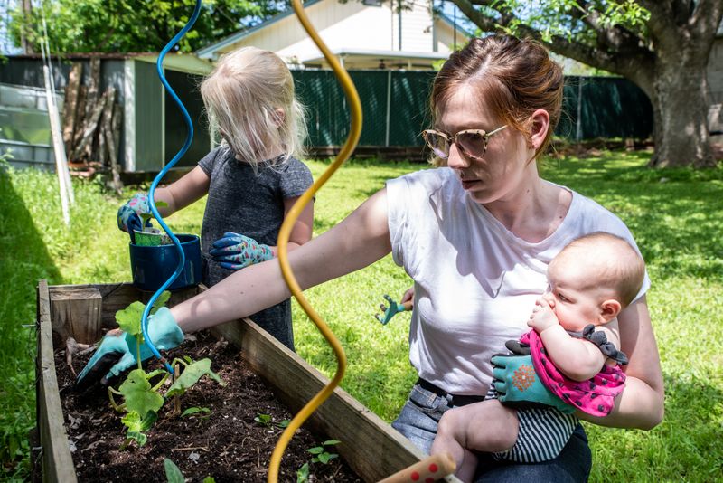 Jaime Calder tends to her vegetable garden in Round Rock