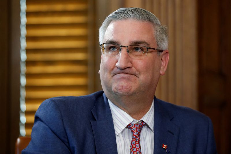 Indiana Governor Holcomb takes part in a meeting on Parliament