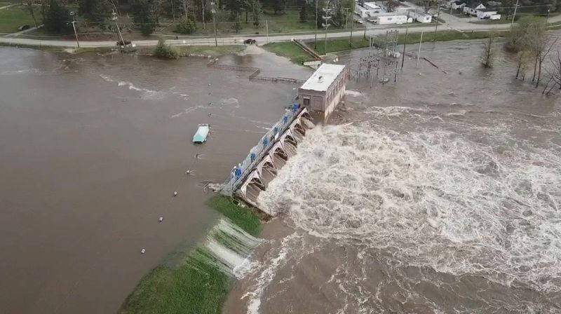 An aerial view of flooding as water overruns Sanford Dam,