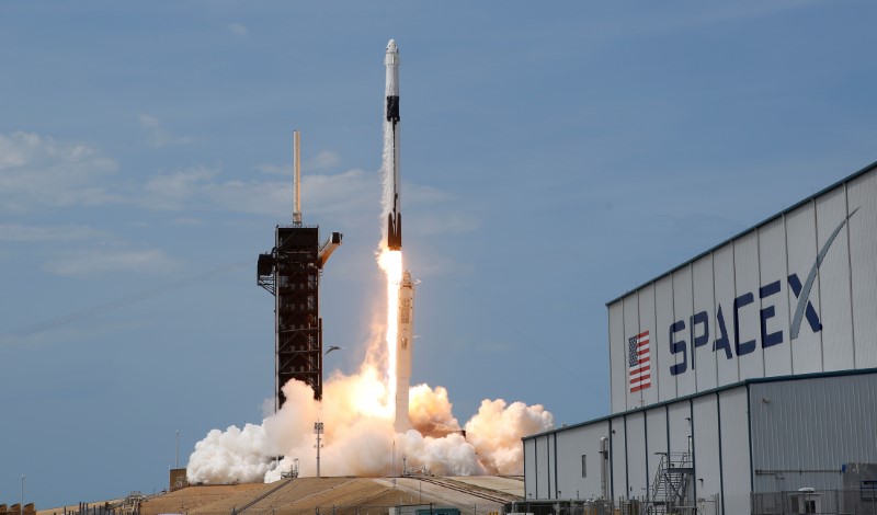 FILE PHOTO: A SpaceX Falcon 9 rocket and Crew Dragon