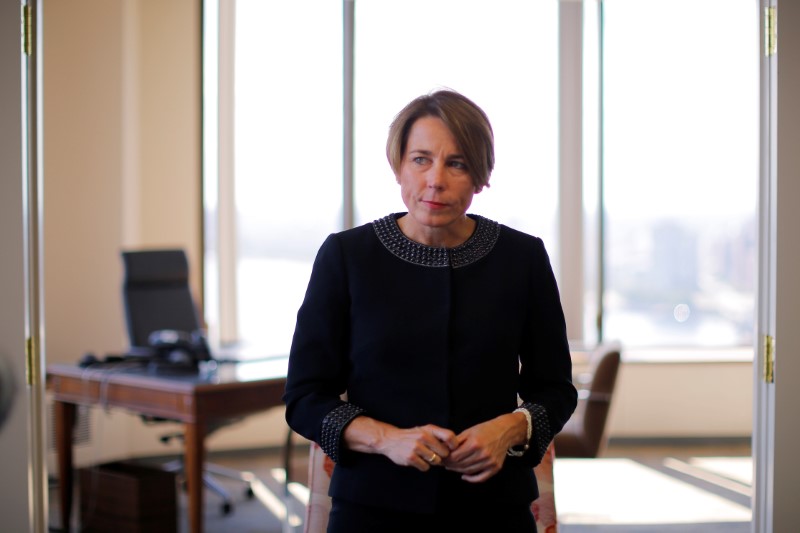 Massachusetts Attorney General Maura Healey listens to a question during