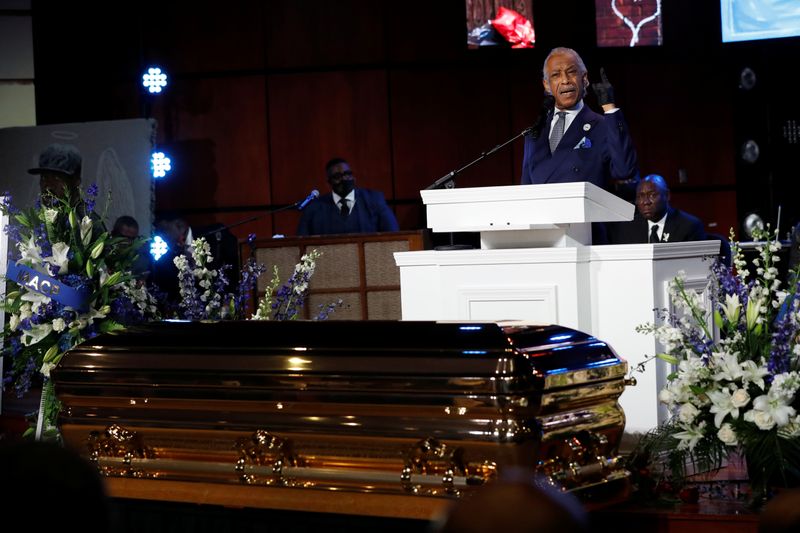 Reverend Al Sharpton speaks during a memorial service for George
