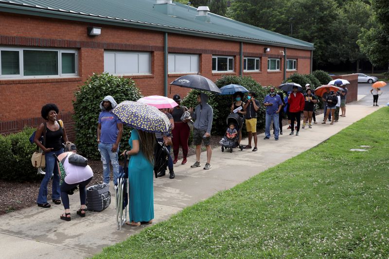 Voters line up to cast their ballots in Atlanta