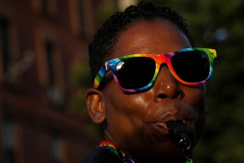 A participant takes part in the Brooklyn Pride Twilight Parade