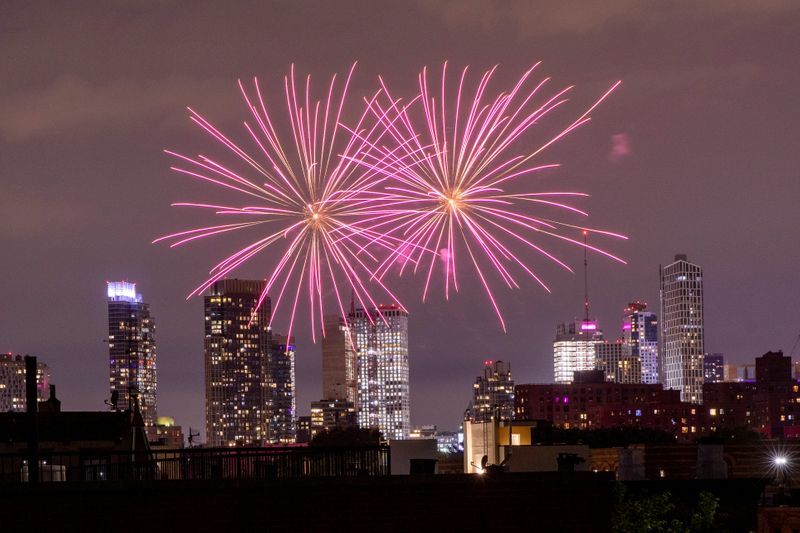 Illegal fireworks illuminate the sky over the Bedford-Stuyvesant neighborhood of