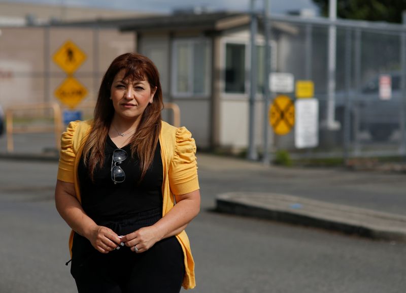 Sandra Videla poses outside the Northwest ICE Processing Center in