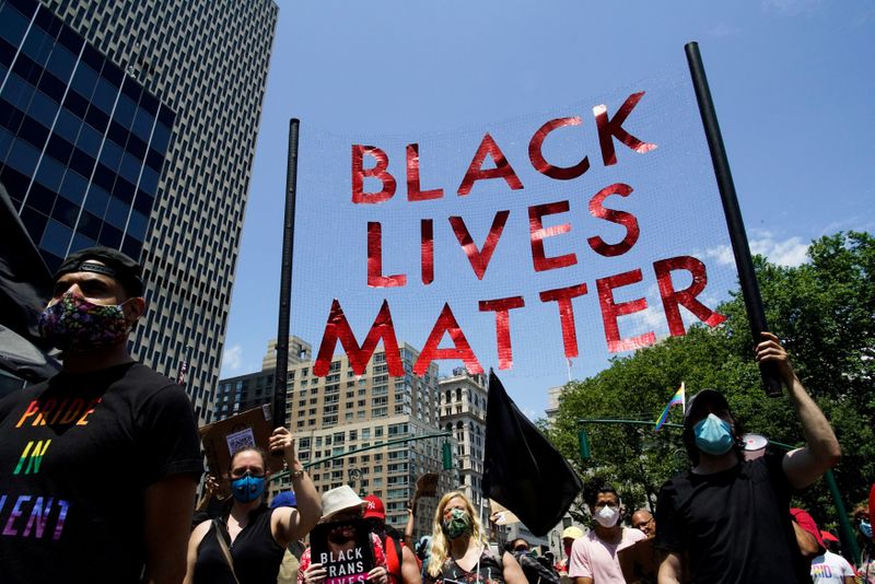 FILE PHOTO: Joint LGBTQ and Black Lives Matter march in