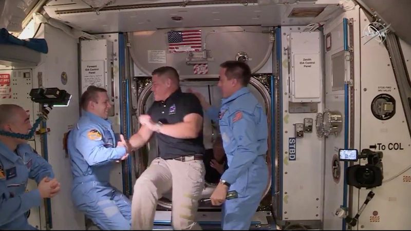 NASA astronaut Bob Behnken and Doug Hurley arrive at the