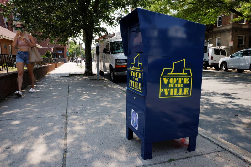 A box to drop off ballots stands on a sidewalk