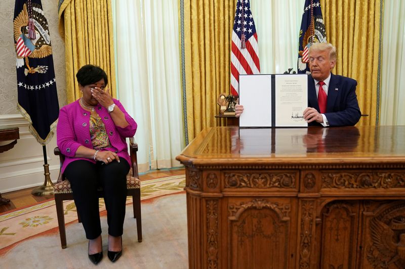 Trump pardons Alice Johnson at the White House in Washington