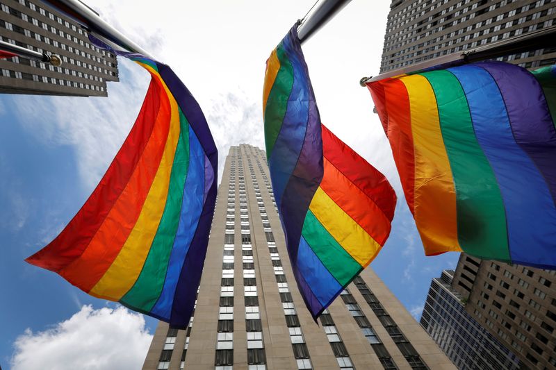 FILE PHOTO: Rainbow flags fly at Rockefeller Center in midtown