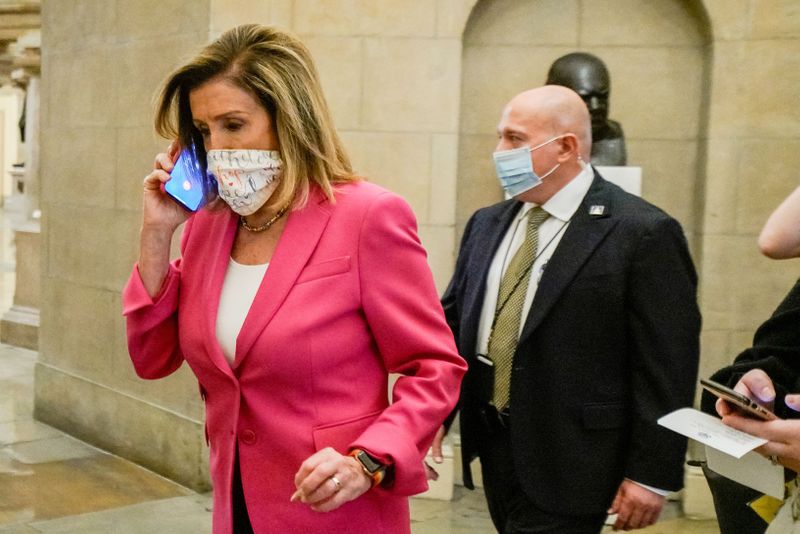Speaker of the House Nancy Pelosi walks into her offices
