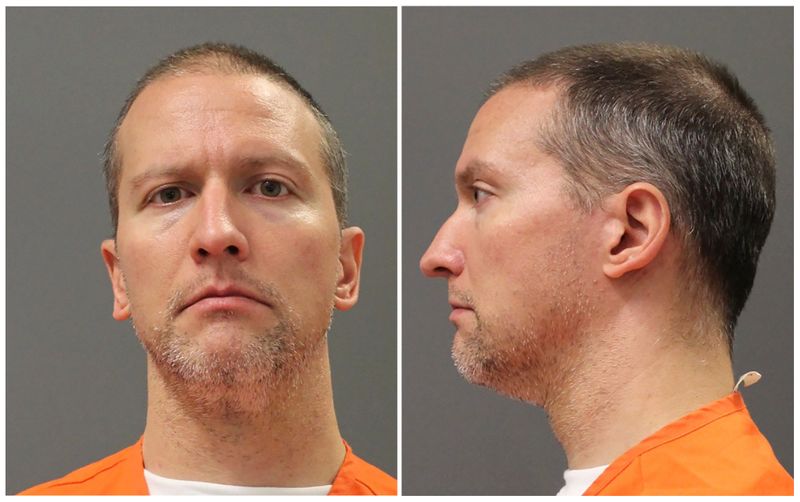 Former Minneapolis police officer Derek Chauvin poses for a booking