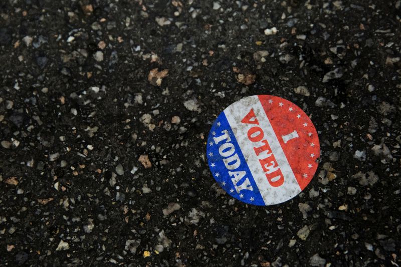 An “I voted today” sticker is seen on the ground
