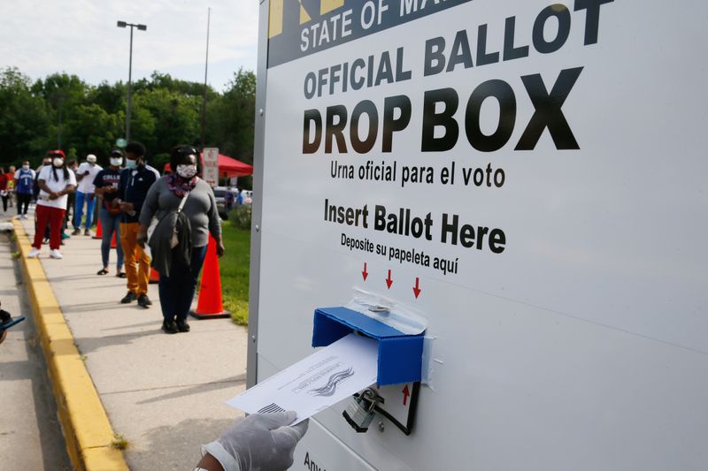 FILE PHOTO: Voters go to the polls to vote in