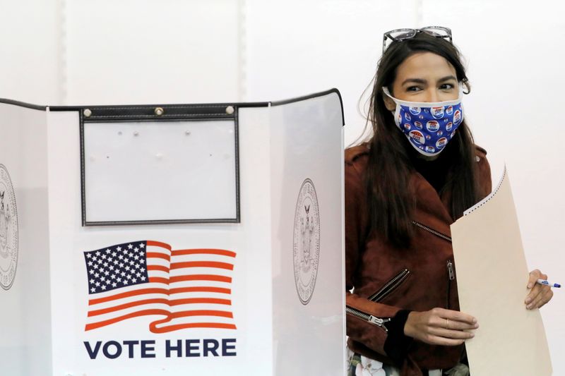 FILE PHOTO: Congresswoman Alexandria Ocasio-Cortez votes early at a polling