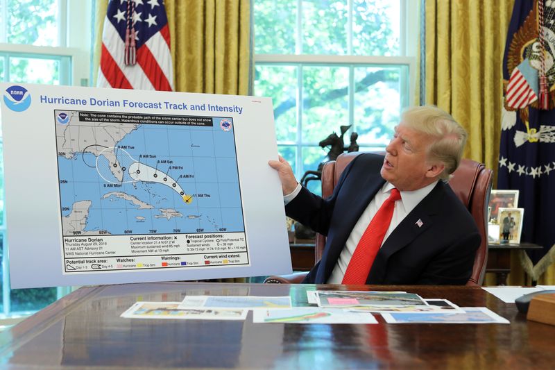 FILE PHOTO: U.S. President Trump receives a Hurricane Dorian update