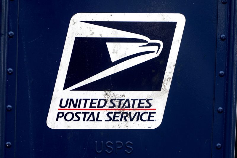 A U.S. Postal Service (USPS) logo is pictured on a
