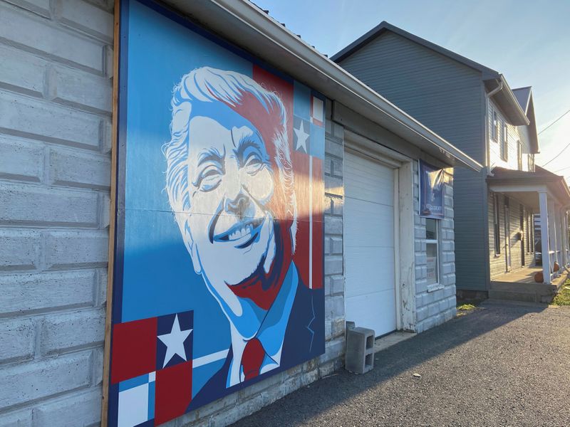 A mural of a smiling U.S. President Donald Trump commissioned