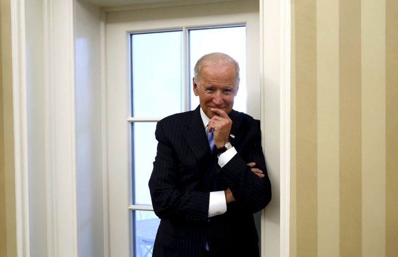 U.S. Vice President Joe Biden looks on as U.S. President