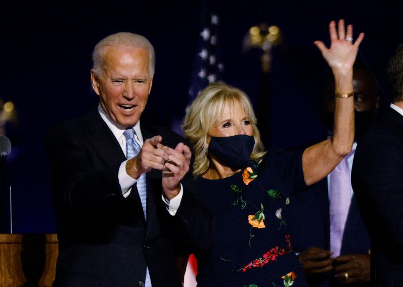 Democratic 2020 U.S. presidential nominee Joe Biden celebrates onstage at
