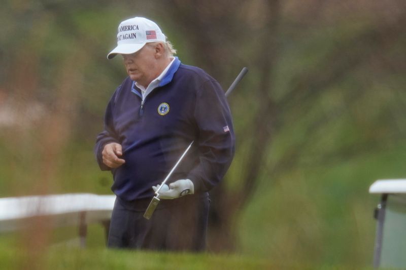 FILE PHOTO: U.S. President Donald Trump plays golf at the