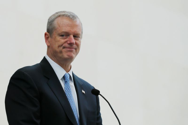 Massachusetts Governor Charlie Baker speaks to incoming U.S. citizens during