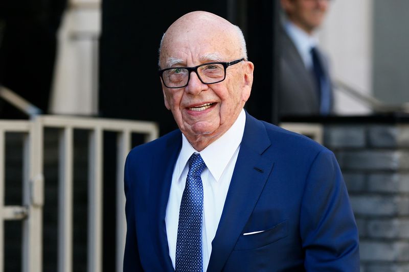 Media mogul Rupert Murdoch leaves his home in London