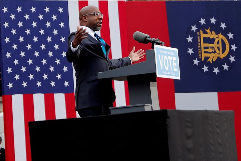 FILE PHOTO: U.S. President-elect Joe Biden campaigns on behalf of