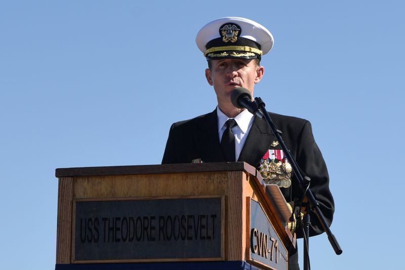 FILE PHOTO: Captain Brett Crozier addresses the crew for the