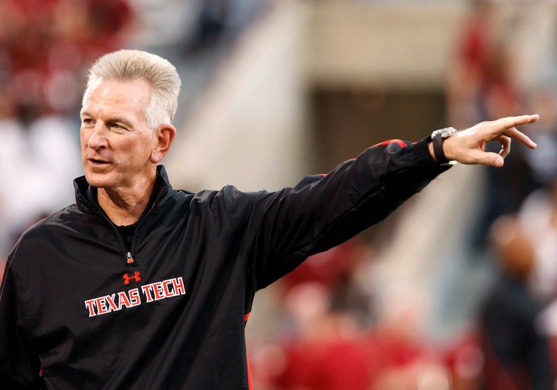 Texas Tech head coach Tuberville gestures during pre-game warm-ups before