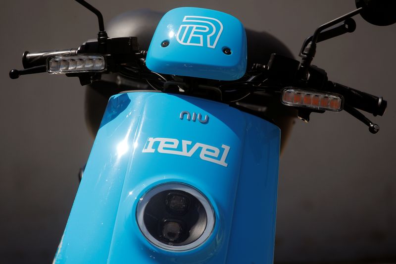Revel app-based electric scooter is parked idle following  suspension