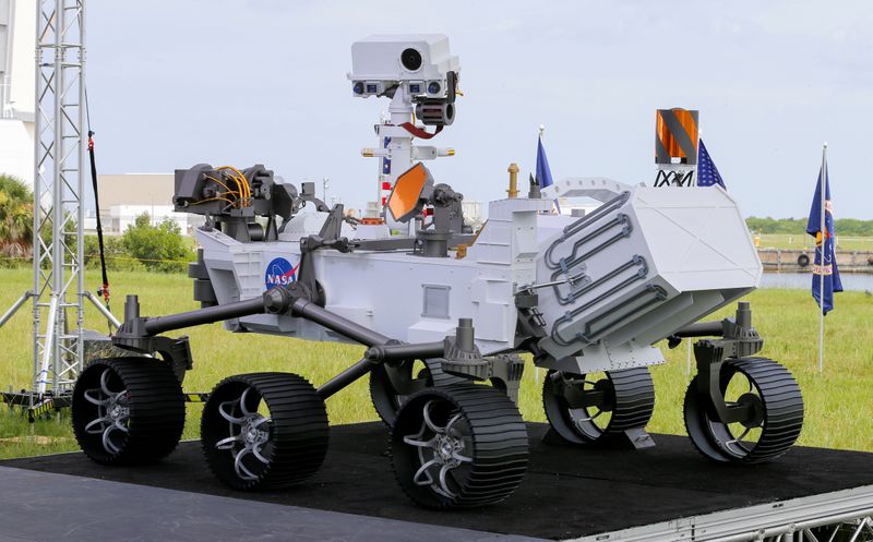 A replica of the Mars 2020 Perseverance Rover is shown