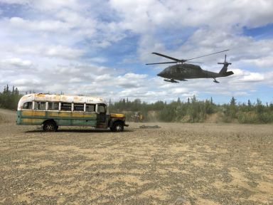 FILE PHOTO: Alaska Army National Guard helicopter hovers near “Bus