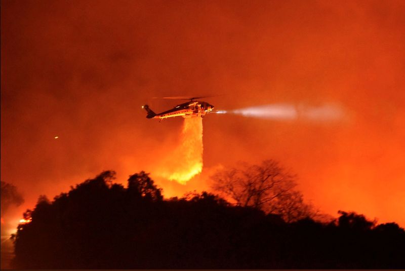 FILE PHOTO: A Los Angeles County Firehawk helicopter makes a