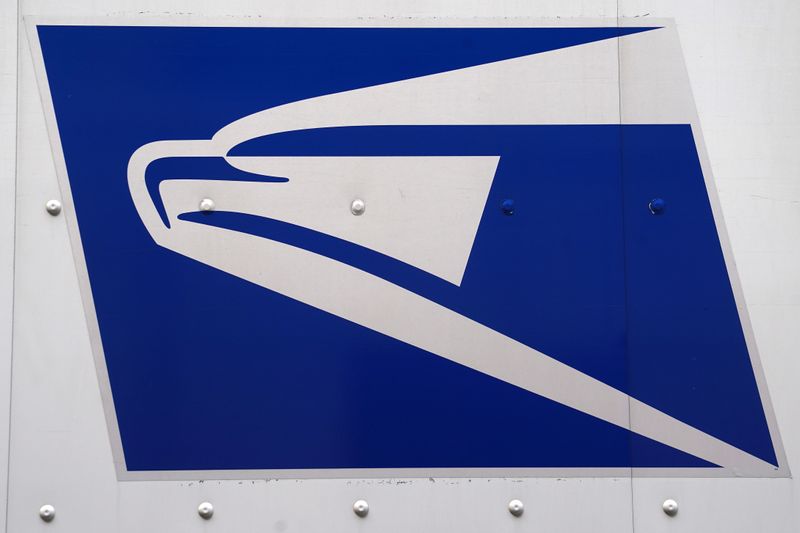 USPS eagle logo is pictured on a truck in Manhattan,