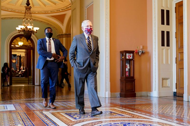 Senate Majority Leader McConnell walks to his office in the