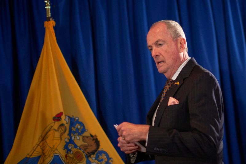 New Jersey Governor Phil Murphy arrives to speak about electronic